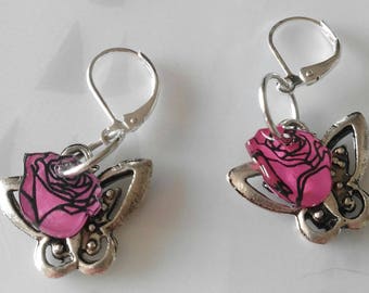 Earrings pink shrink plastic and butterfly.
