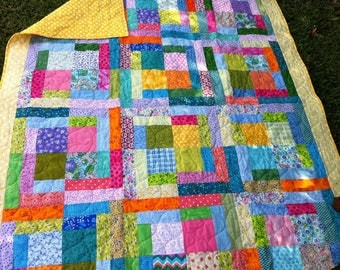 Bright blocks lap quilt