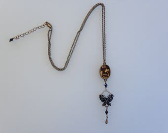 Necklace "Butterfly" and paper Japanese cherry blossoms.