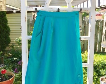Vintage turquoise skirt with button detail