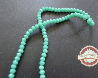 50 PC wood beads, faceted turquoise blue glass 2x3mm