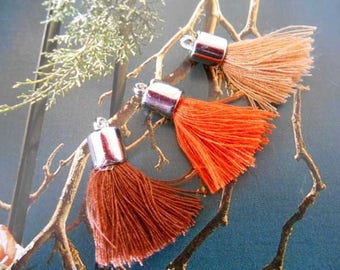 x 3 PomPoms in shades of Brown.