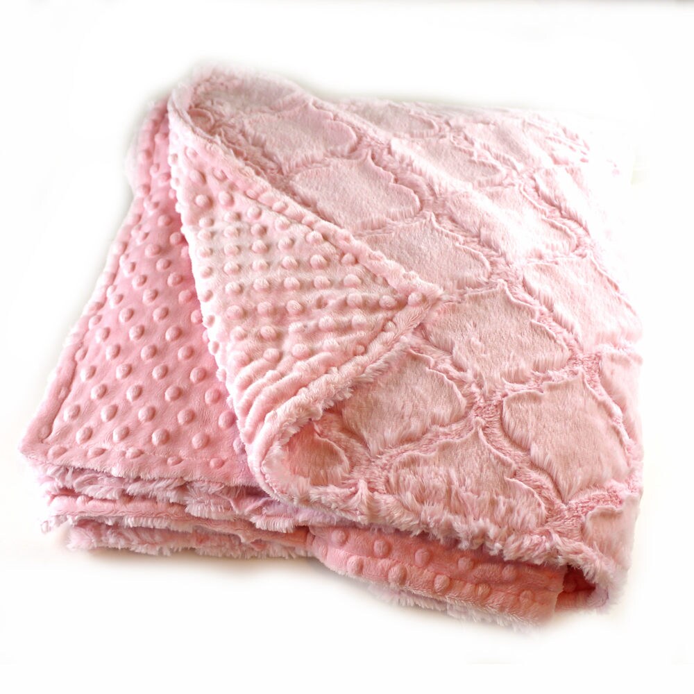 Pink throw blanket Pink Throw Blankets: Add a touch of warmth to your bed with a craftily placed throw blanket.