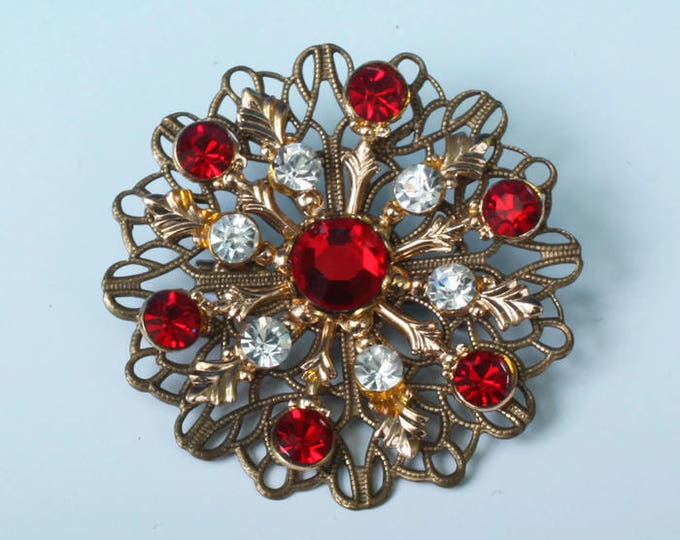 Red and Clear Rhinestone Filigree Brooch Gold Tone Atomic Style Vintage