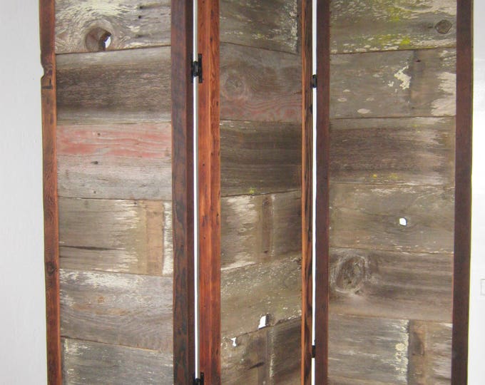 Screen made from reclaimed barn wood.