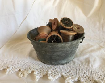 13 Large Vintage Wooden Spools of Thread in Galvanized Tub