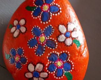 Stone has orange flower