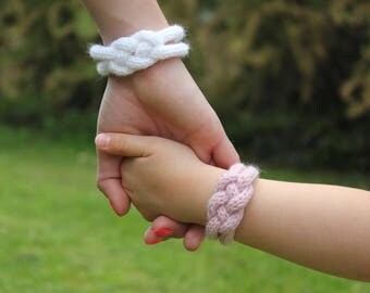 Pair of knitting, wool jewelry bracelet