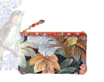 Small cosmetic case in multicolor floral fabric