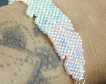 Pastel feather with 925 sterling silver chain bracelet