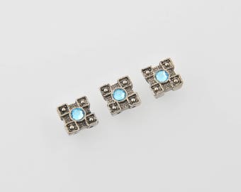 Decorated metal separator spacer bead