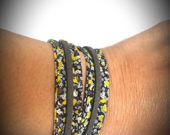 Bracelet obliquely and gray suede cord
