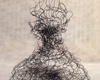Handknitted sculptural baskets, vessels