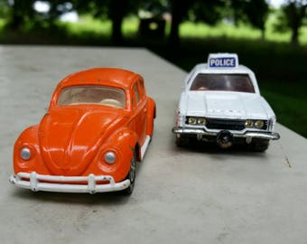 Corgi whiz wheels vw bug & police car