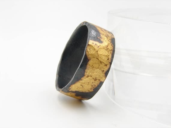 Mens wedding ring. Hammered sterling silver ring with 24k yellow gold infused. Oxidized and sealed.