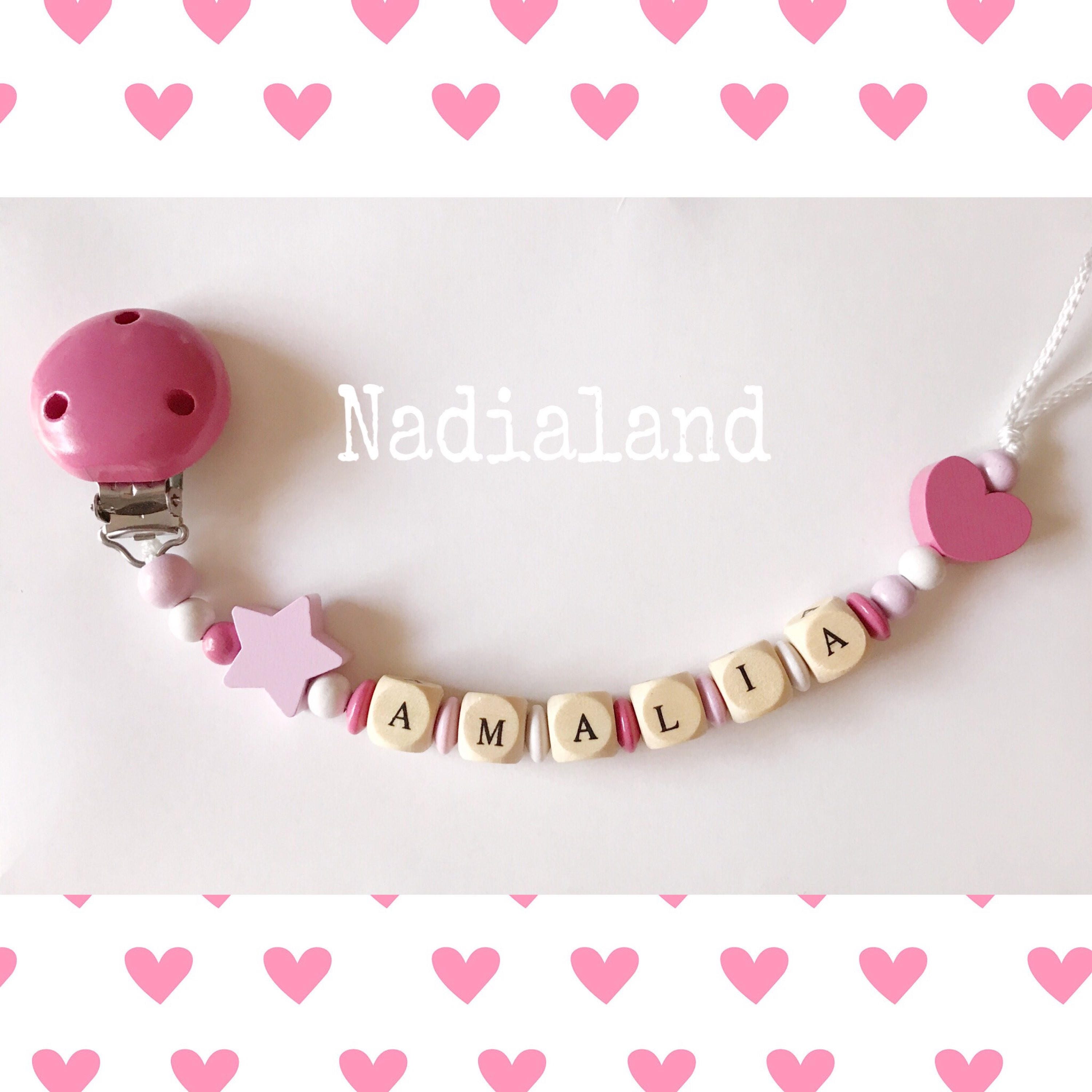 Pacifier holder with the name of the baby