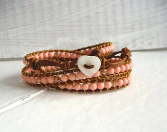 Bracelet type chan luu in coral pink/wrap bracelet