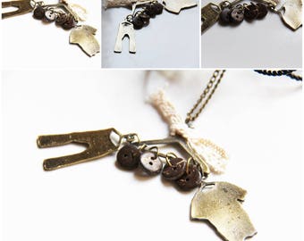 The pendant garment bronze/gold color theme