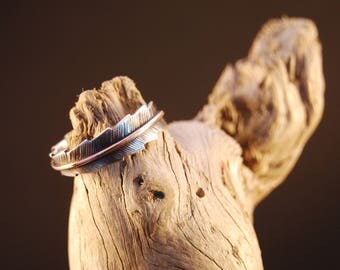 Silver ring original and handcrafted earmuff "pluma"