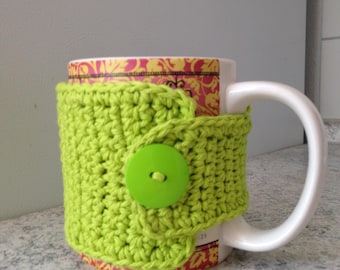 Lime green crochet cup cozy with a button, crochet mug cozy