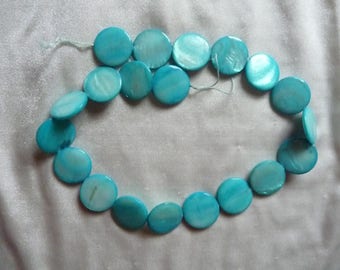 Beads, Mother of Pearl, 20mm Flat Round Coin, Shades of Blue. Sold per 15 inch strand. There are 20 beads on this strand.