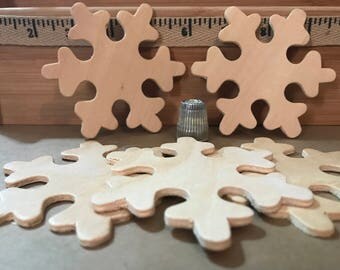 D- unfinished wooden snowflakes