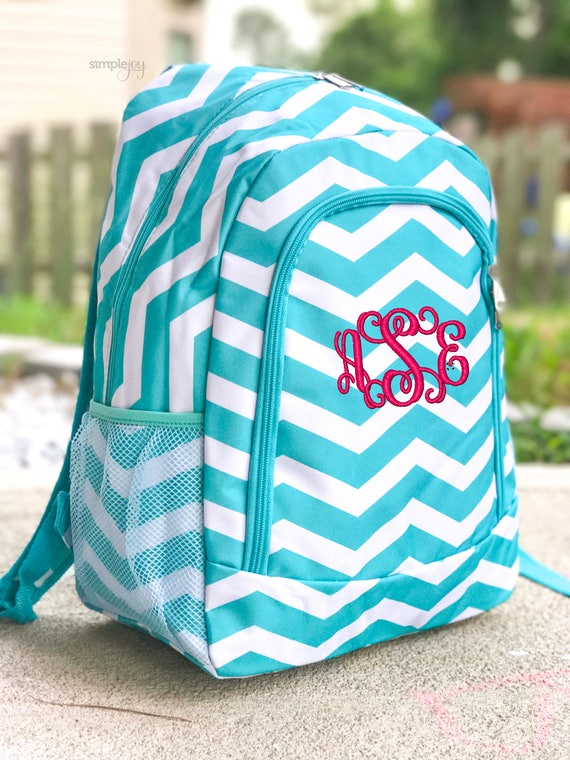 teal and black backpack