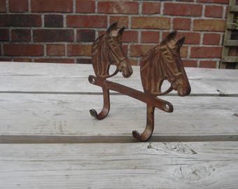 Porte torchons chevaux métal. France