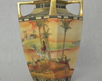 Vintage Nippon Porcelain Gold Trimmed 4 Handled Vase with an desert motif