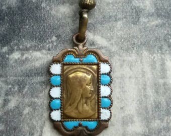 Antique brass and turquoise enamel Virgin Mary pendant necklace .