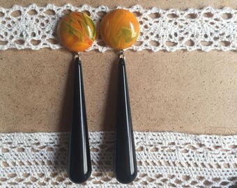 Lucite and resin earrings with black long drop.