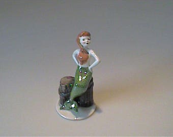 1990 Hagen Renaker specialty irideacent mermaid on piling