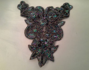applique lace with pearls and dark blue glitter.