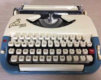 Vintage portable typewriter Princess 300 mechanical typewriter blue