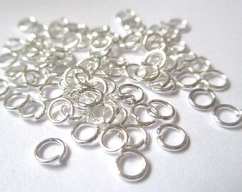 250 4mm silver jump rings