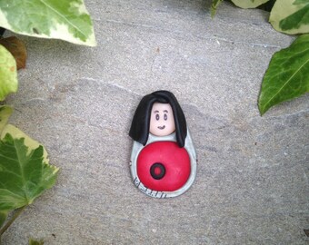 "Polymer clay pendant" the little girl in red and black "