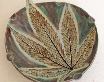 420 Ware ~ Round Fantastic, in greens, golds and blues, with glow.