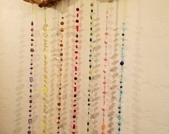 Enjoy this multi-colored glass bead wind chime, For your home or Garden.