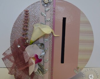Pink and silver urn with envelopes