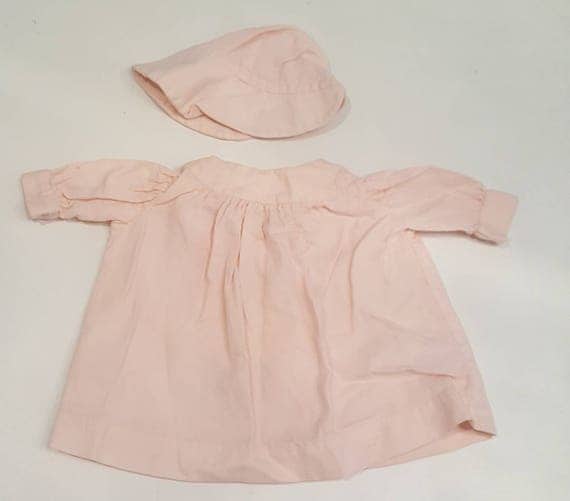 Vintage pink dress and bonnet baby outfit