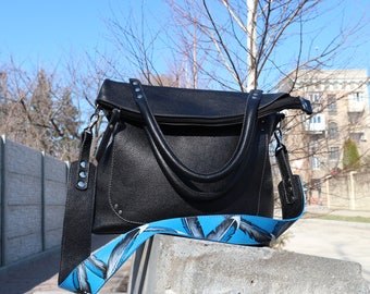 black bag over shoulder