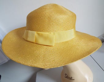 Vintage Ladies Yellow Straw Wide Brimmed Hat with Grosgrain banding and bow on side by Kangol