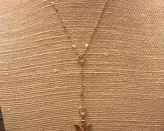 simple gold arrowhead lariat style necklace