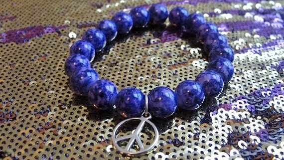 Purple Bead Bracelet With Peace Charm